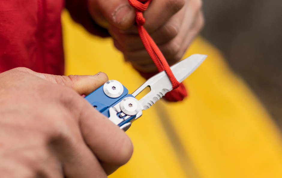 cutting a cord with the combo blade on a Leatherman Signal