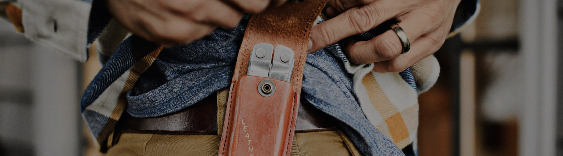 Leatherman Rebar in a Leatherman Heritage sheath on a man's belt