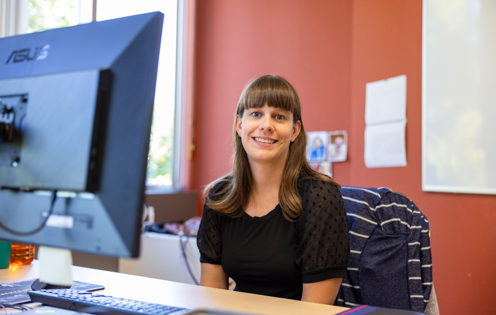 Mellisa Covel sitting on her computer table